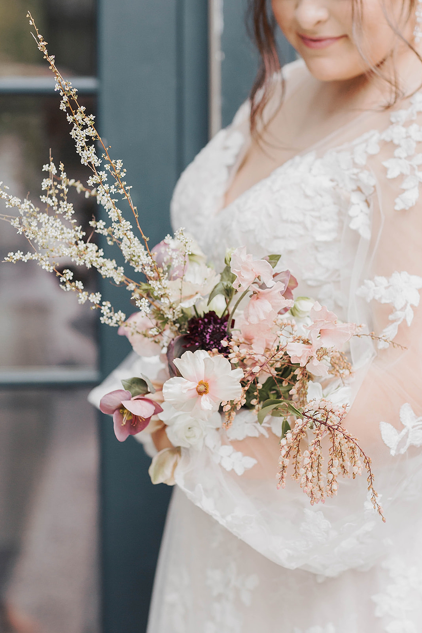 Detail of bridal bouquet held by bride | Carters Event Co