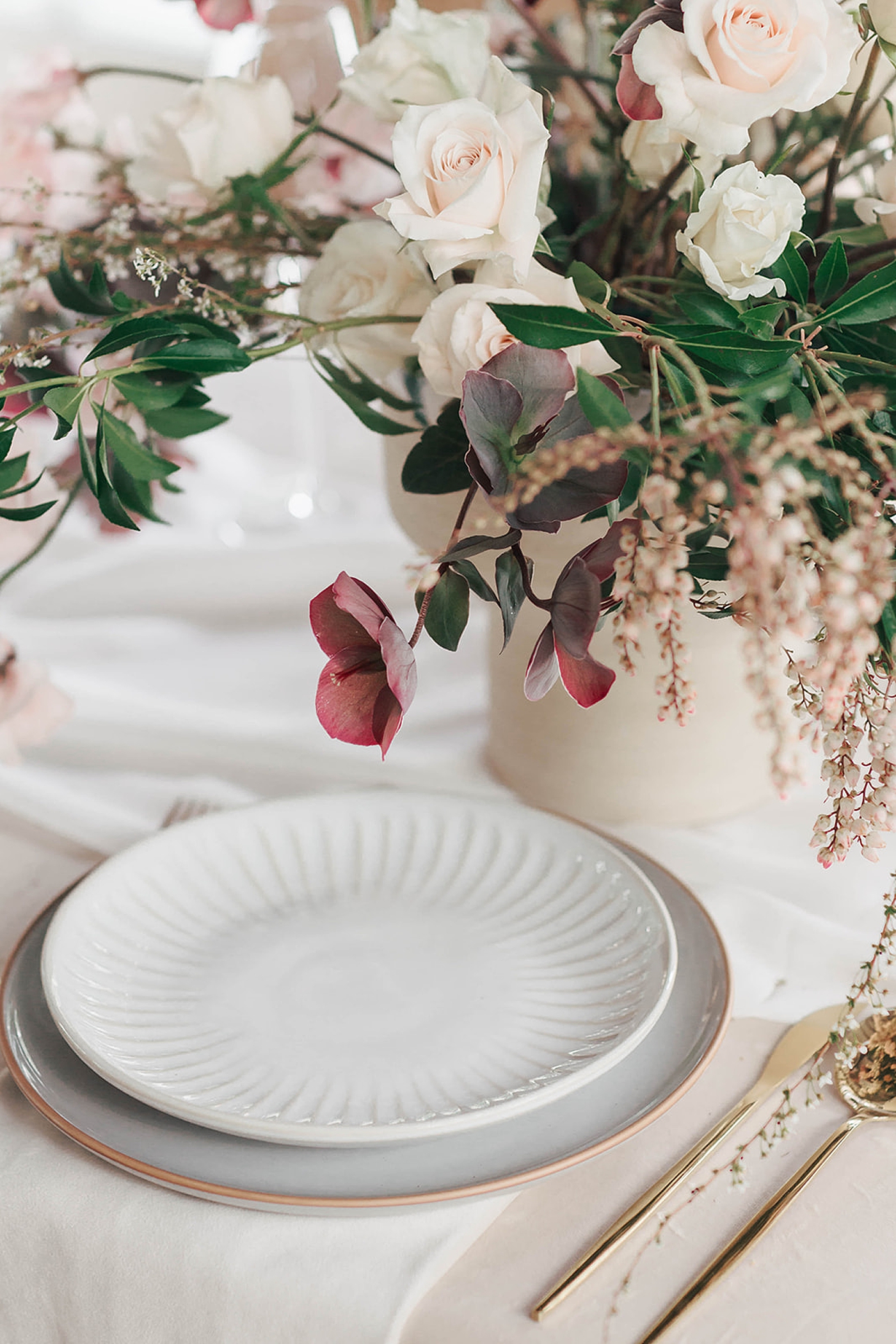 Details of maroon hellebore and a table setting | Carters Event Co