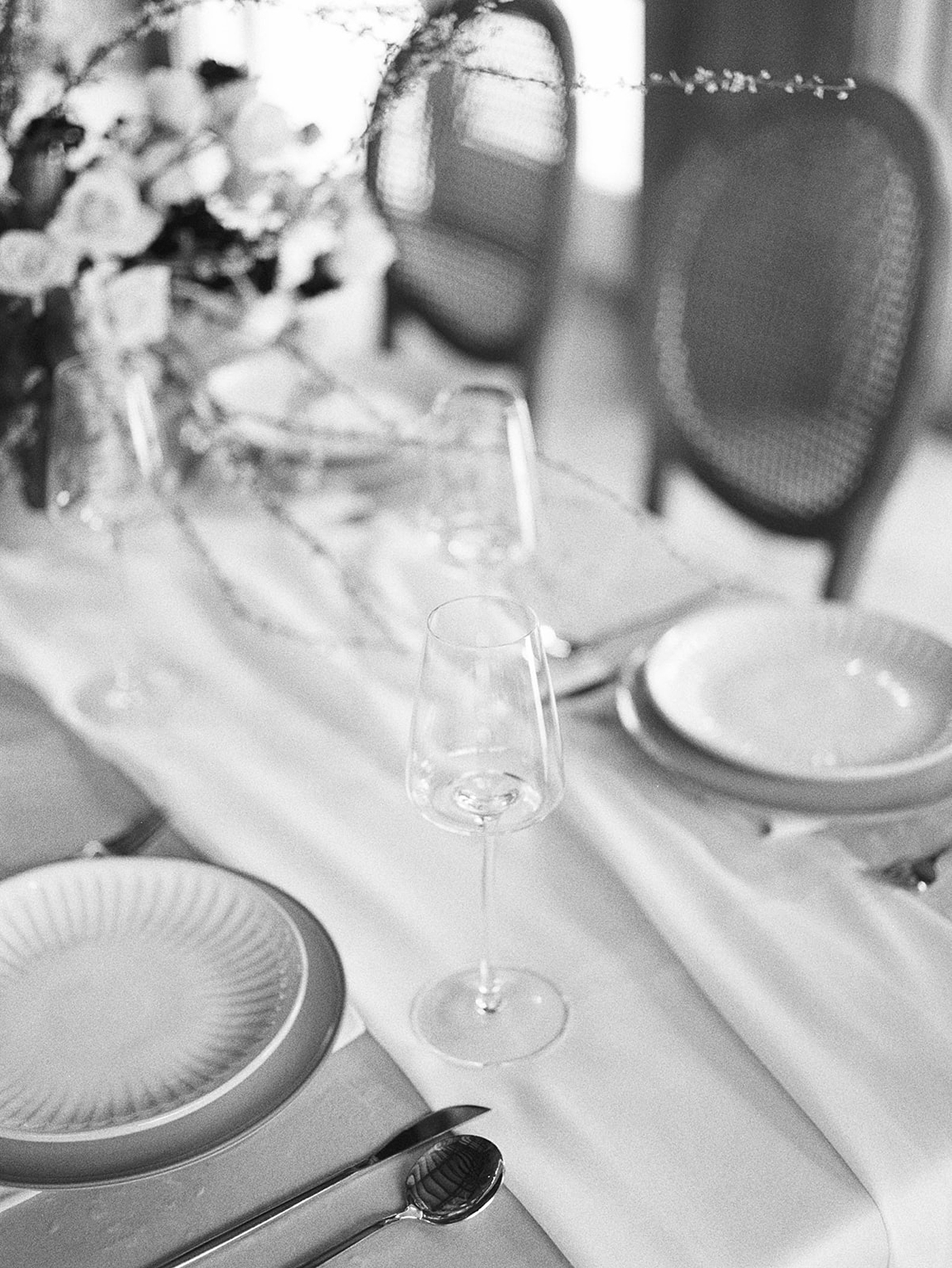 Black and white image of wine glasses on a table | Carters Event Co