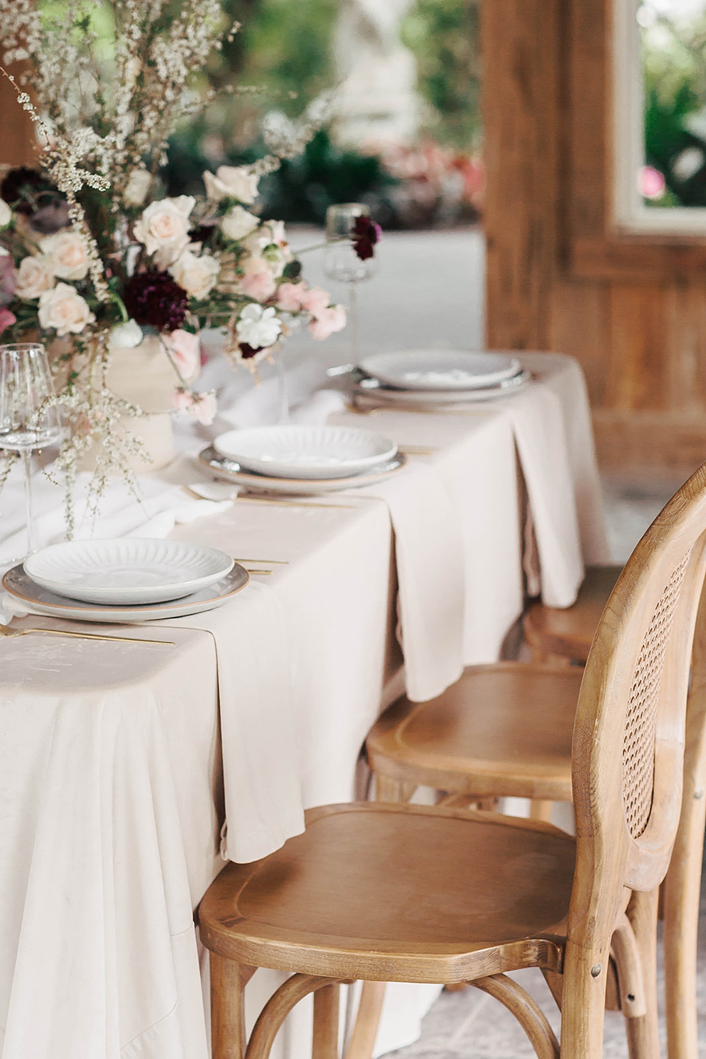 Wedding table with soft colored florals and linens | Romantic French Countryside Editorial by Carters Event Co