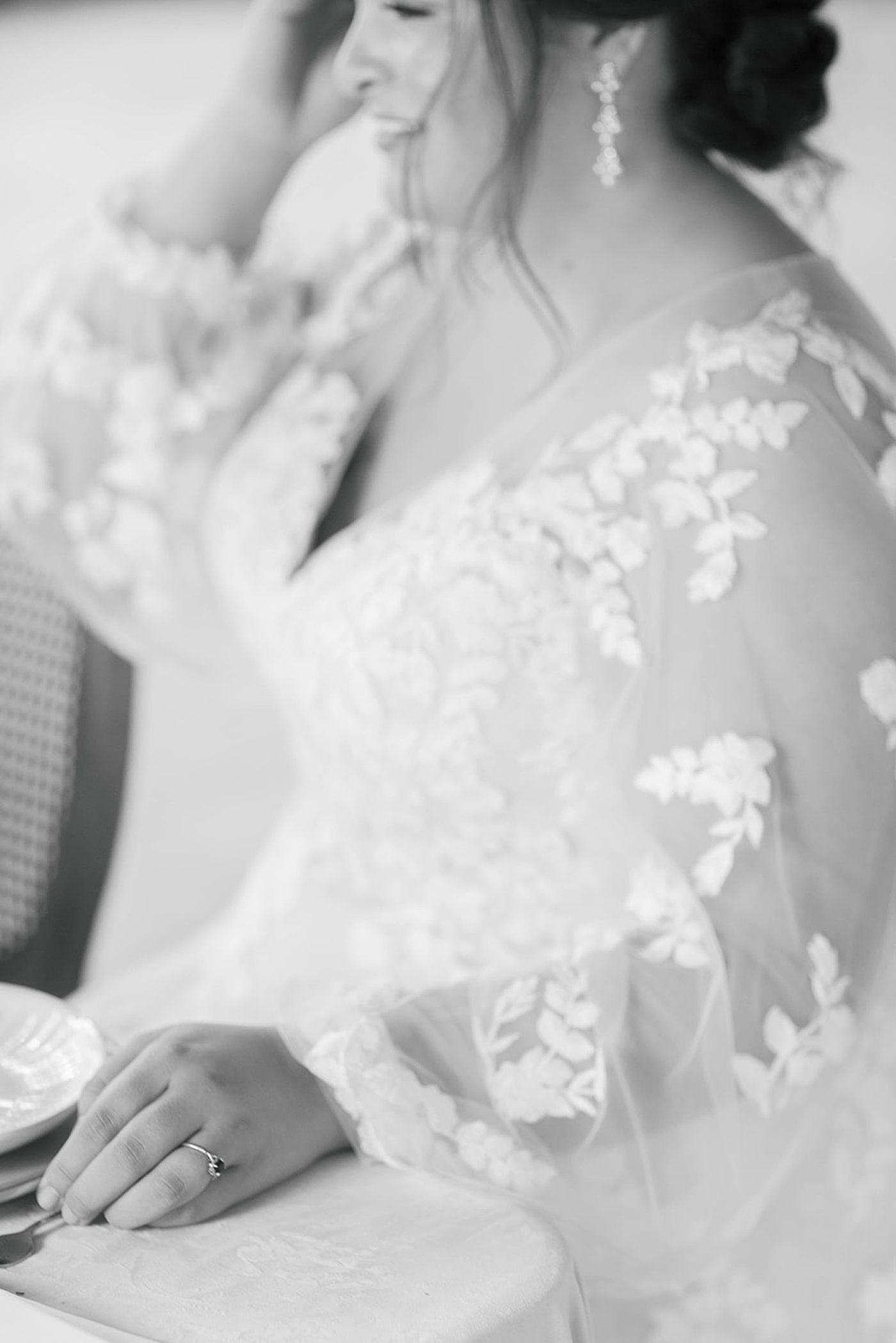 Black and white image of bride at a table | Carters Event Co