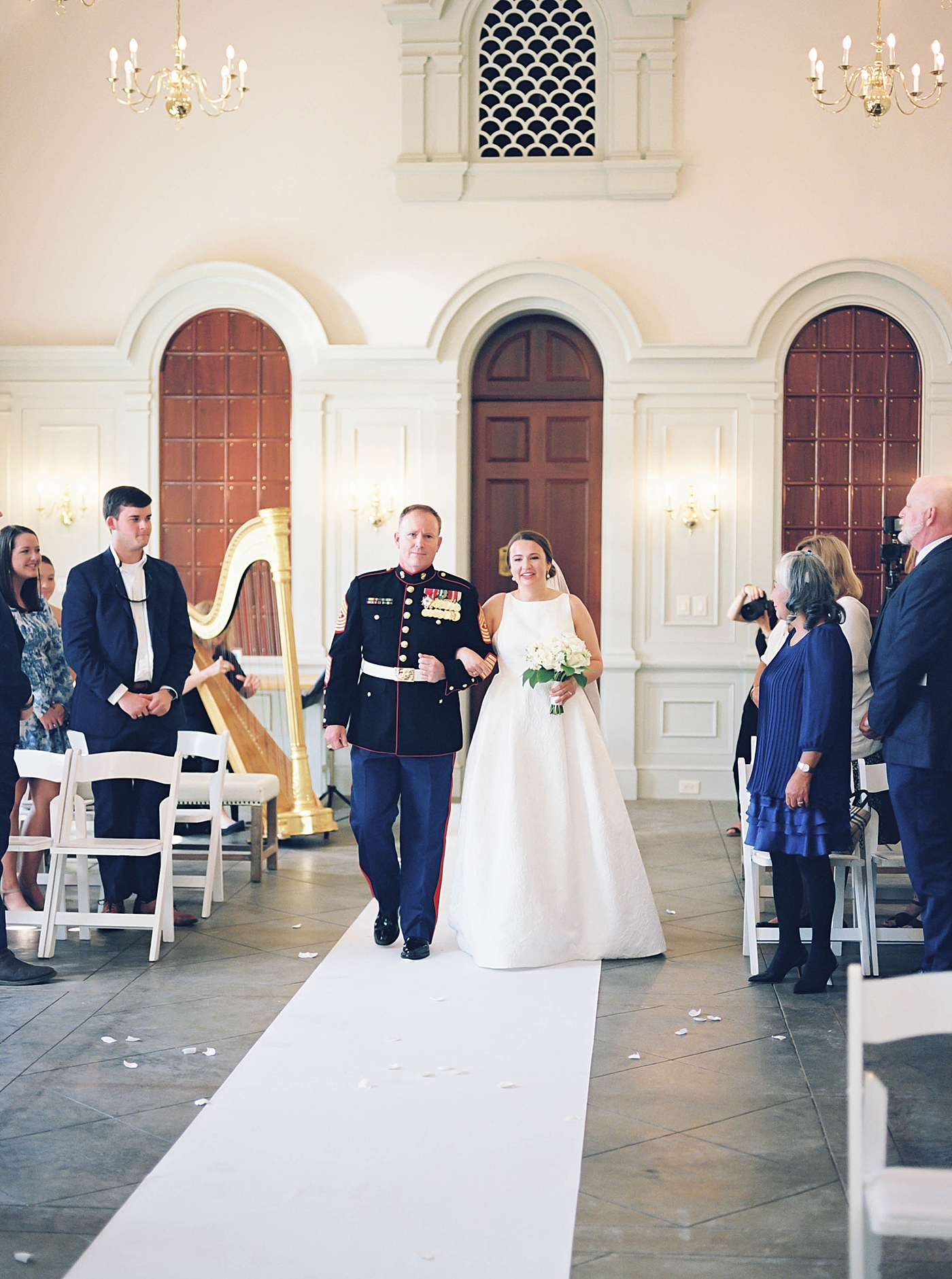 Bride being walked down the aisle during Intimate spring wedding | Carters Event Co