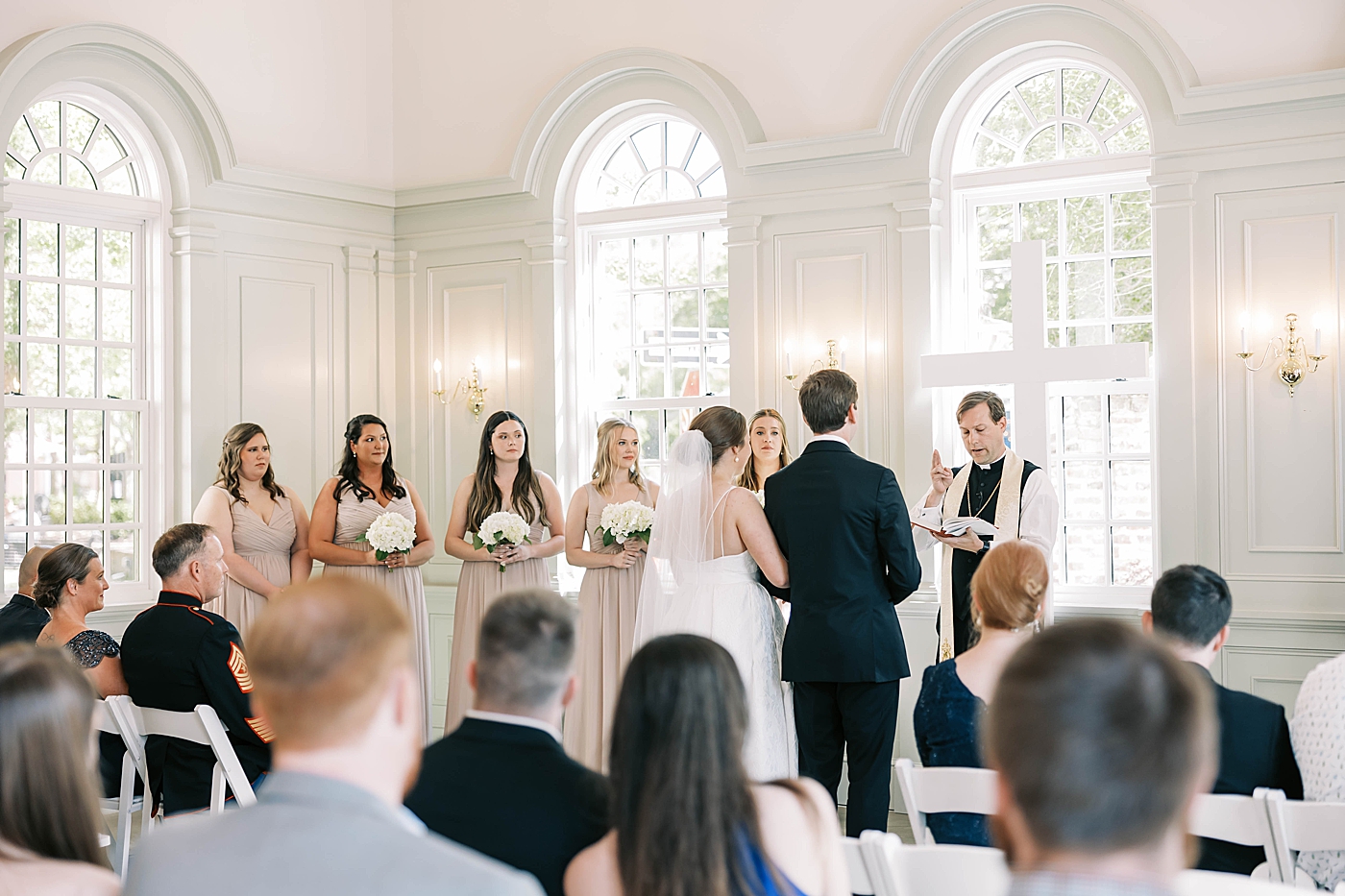 Bride and groom exchange vows during their Intimate spring wedding | Carters Event Co
