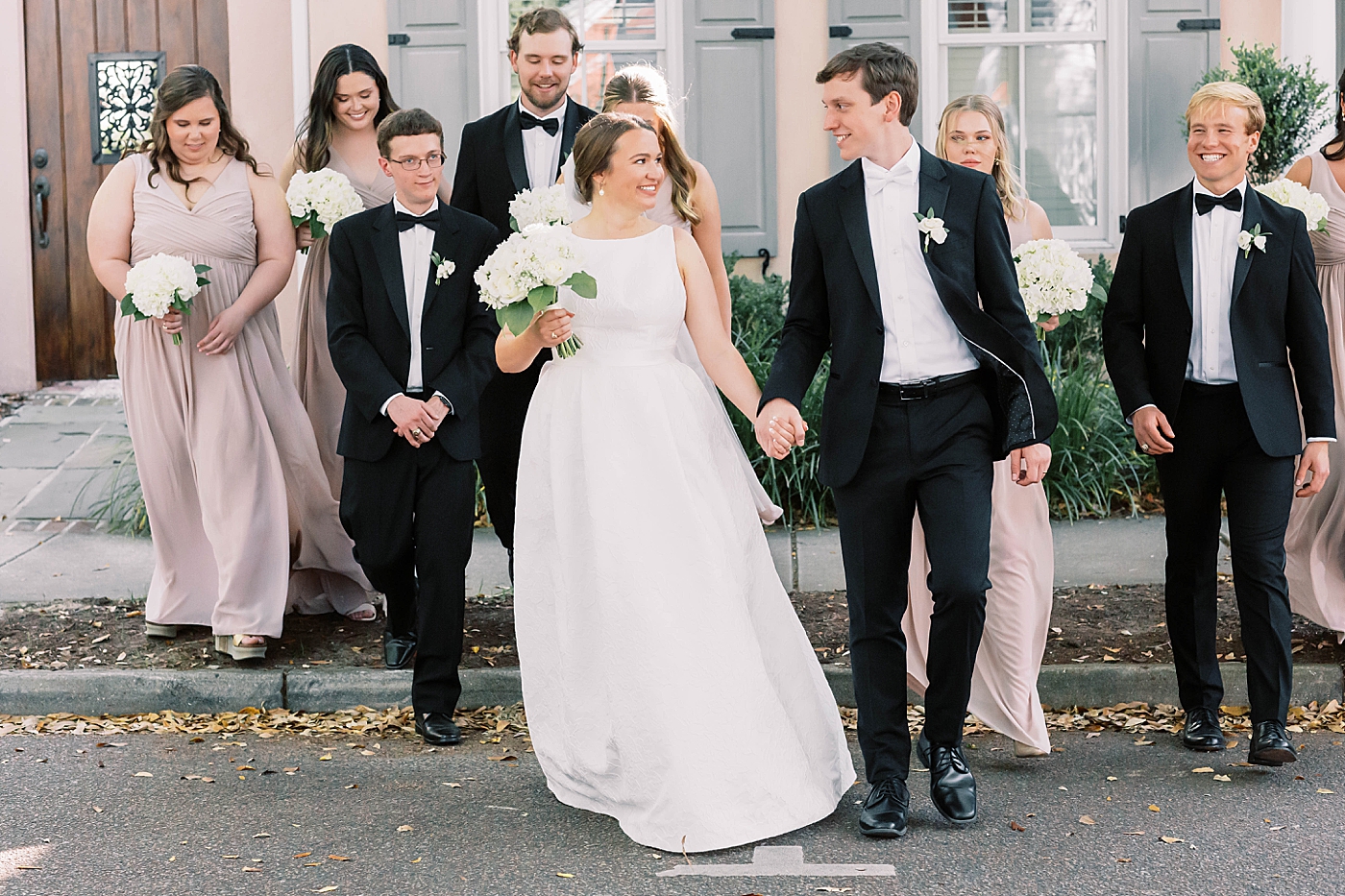 Bride and groom with their wedding party during their Intimate spring wedding | Carters Event Co