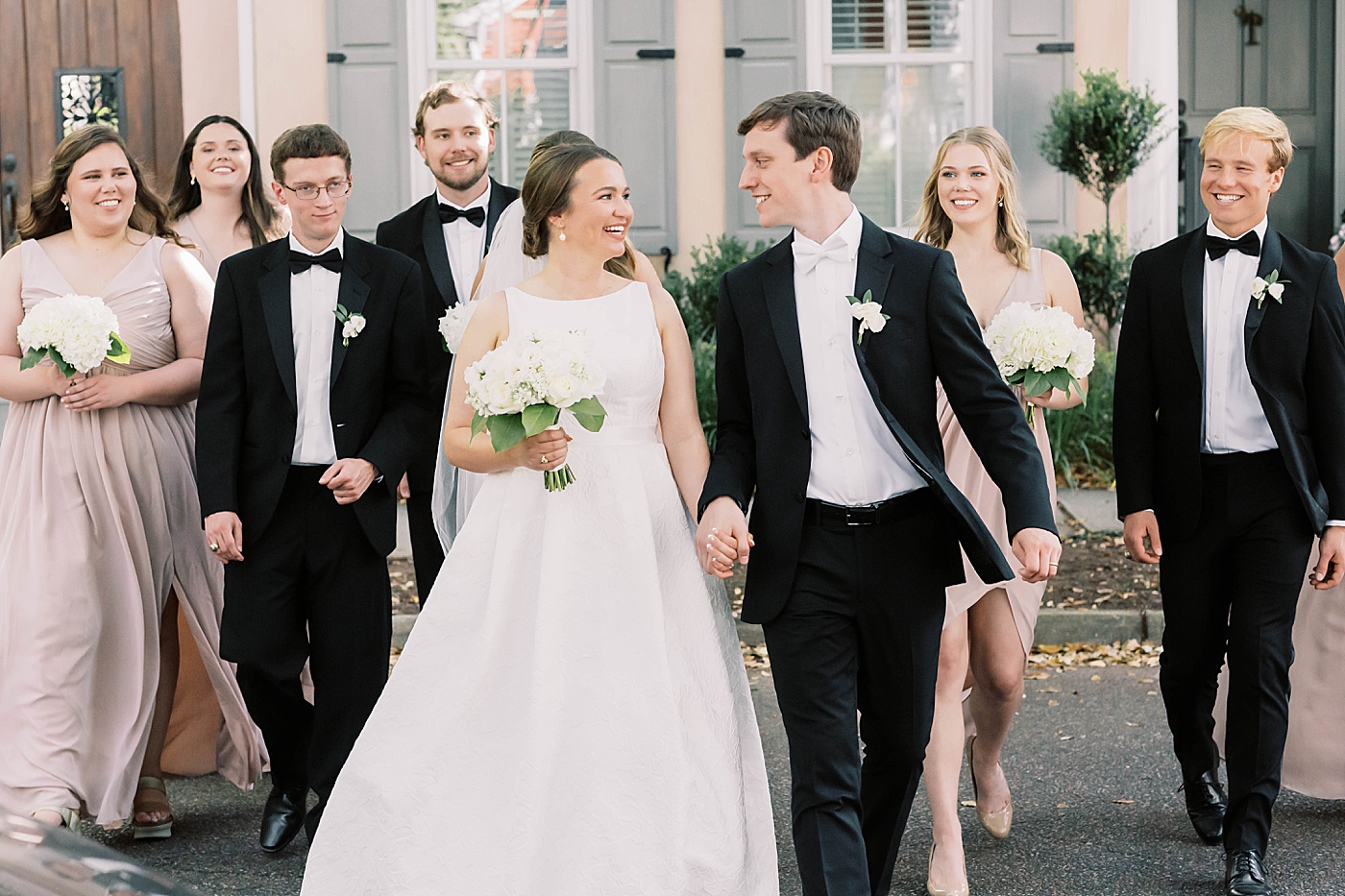 Bride and groom with their wedding party during their Intimate spring wedding | Carters Event Co