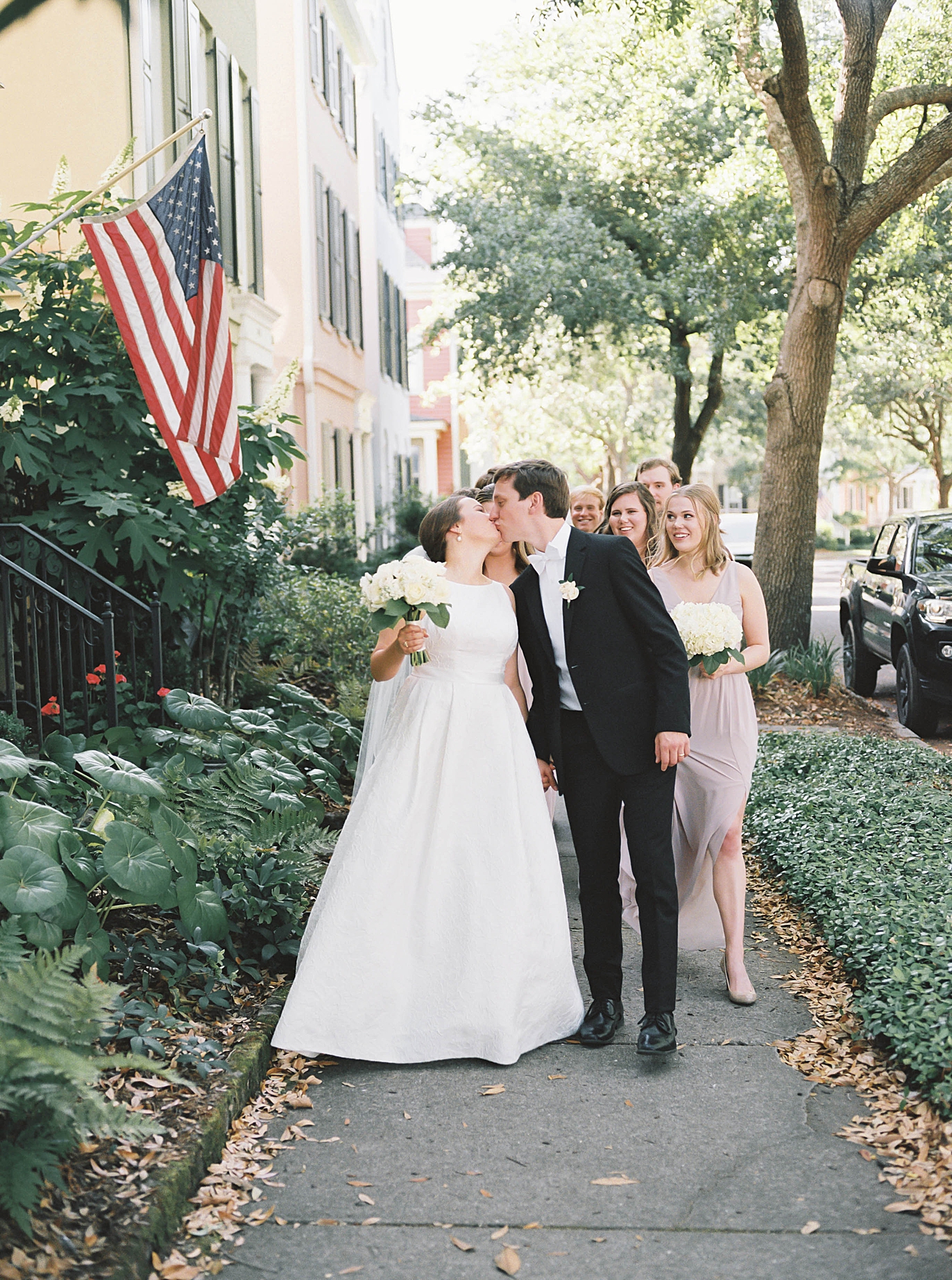 Bride and groom kissing at I'On wedding | Carters Event Co