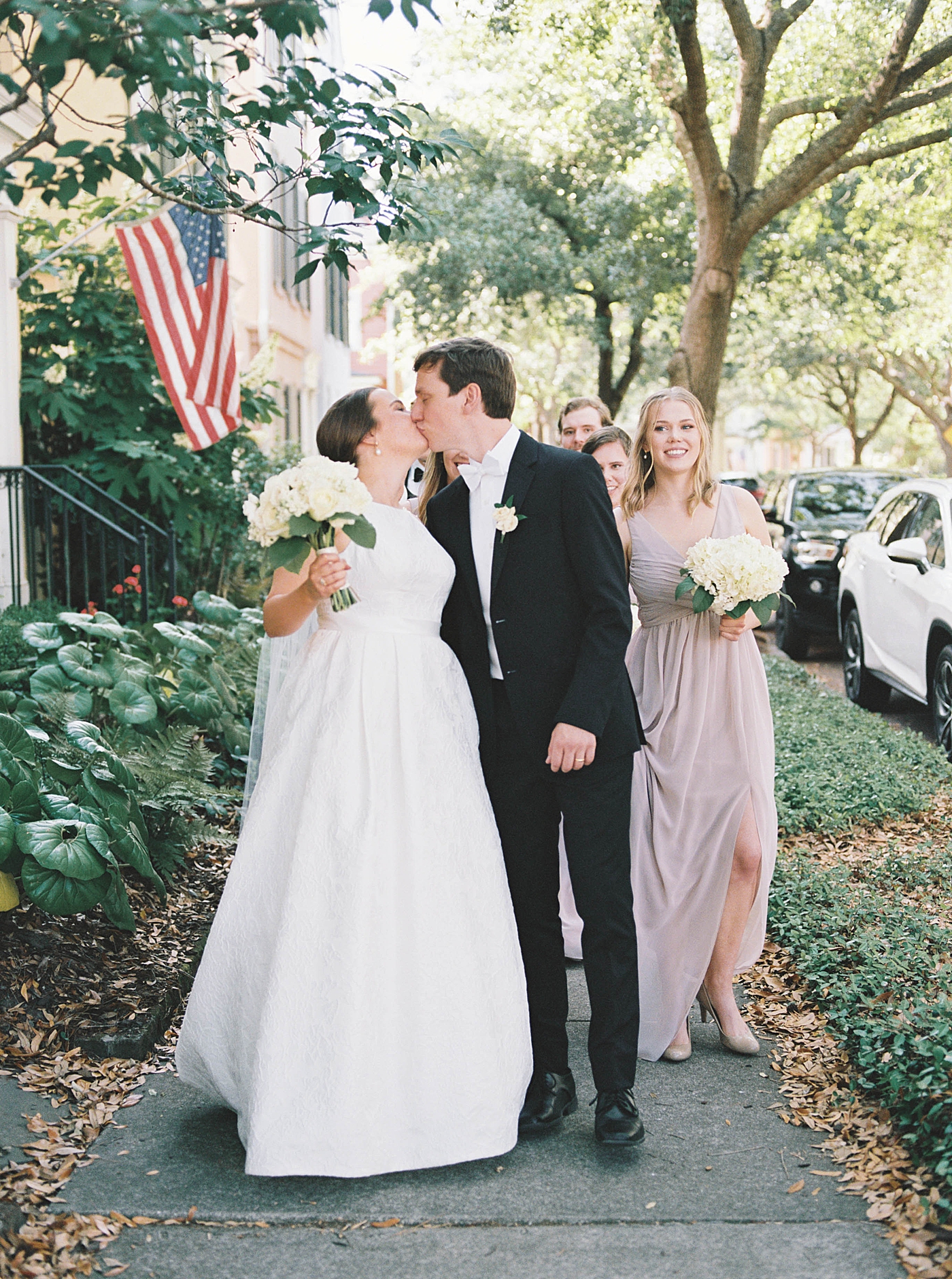 Bride and groom kissing during their Intimate spring wedding | Carters Event Co