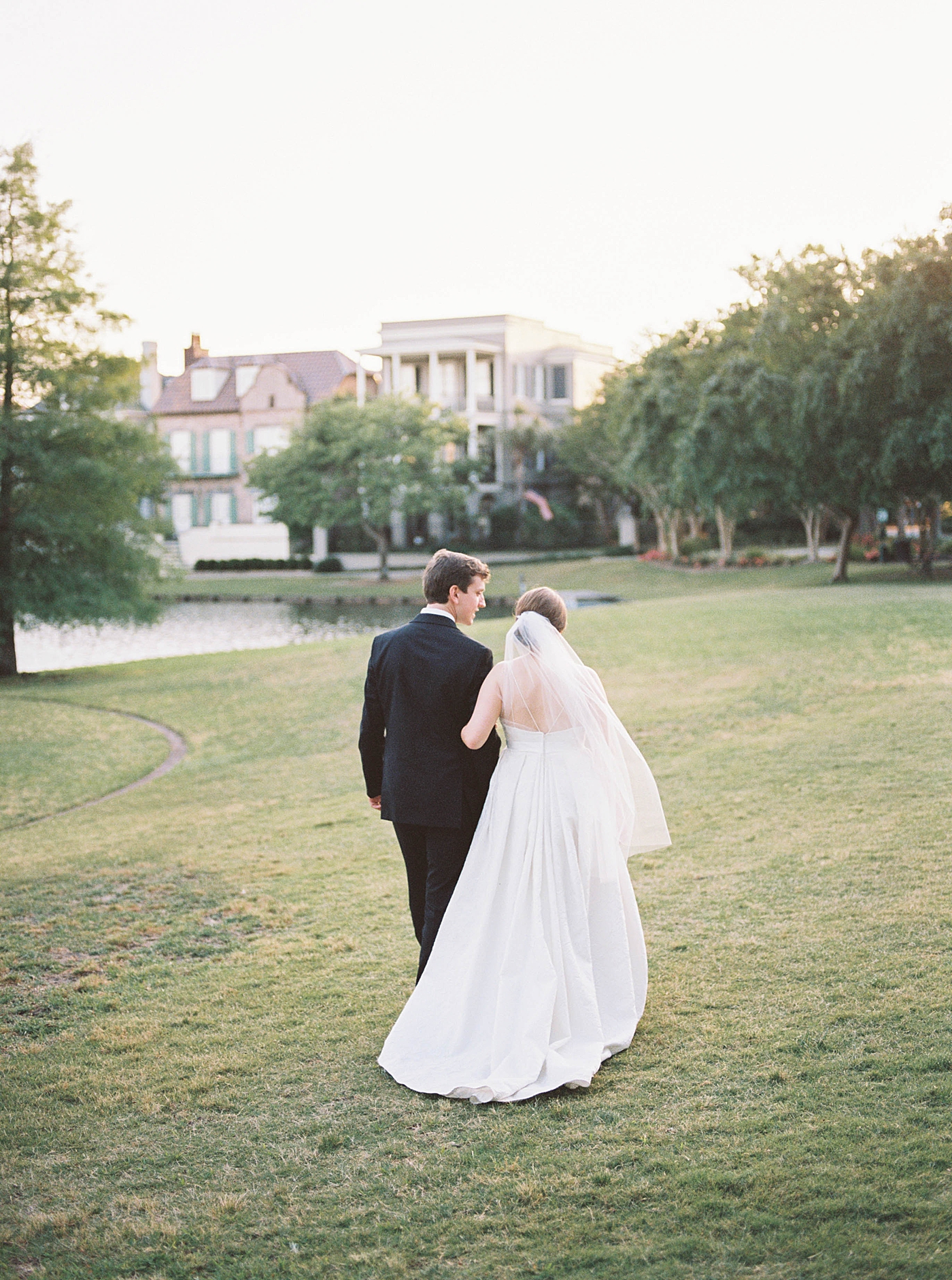 Bride and groom walking at I'on | Carters Event Co