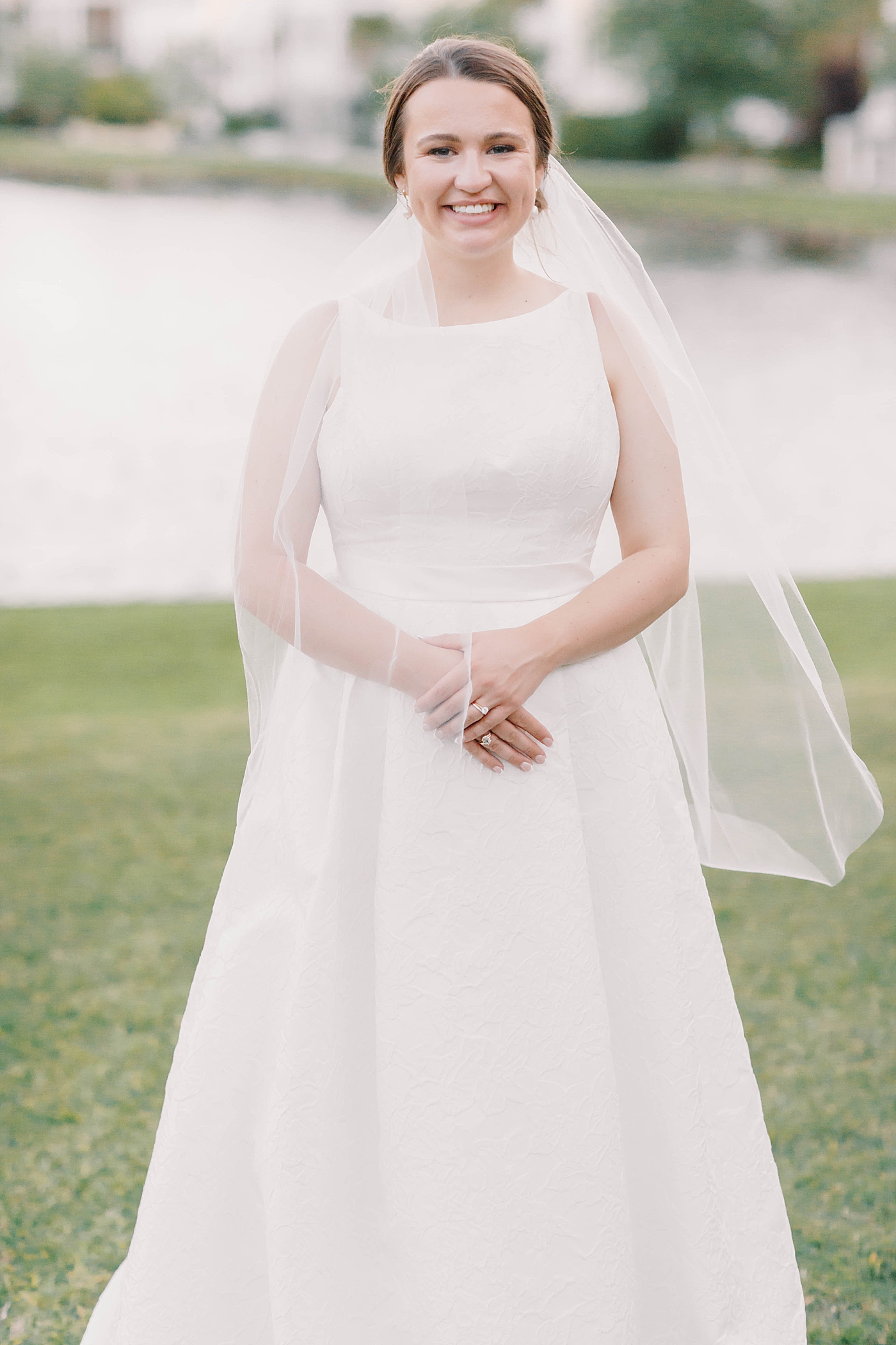 Bridal portrait of bride near a lake | Carters Event Co