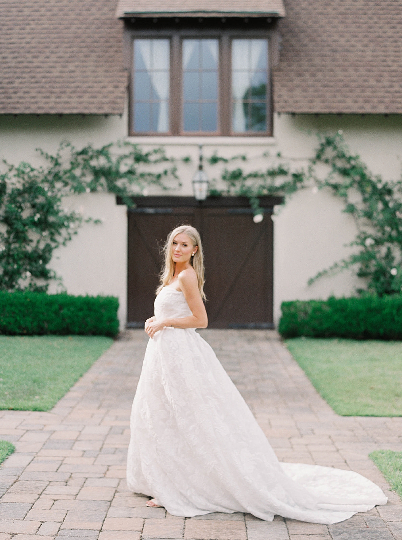 Bride posing in an embroidered dress | Charleston Photography Workshop with Carters Event Co