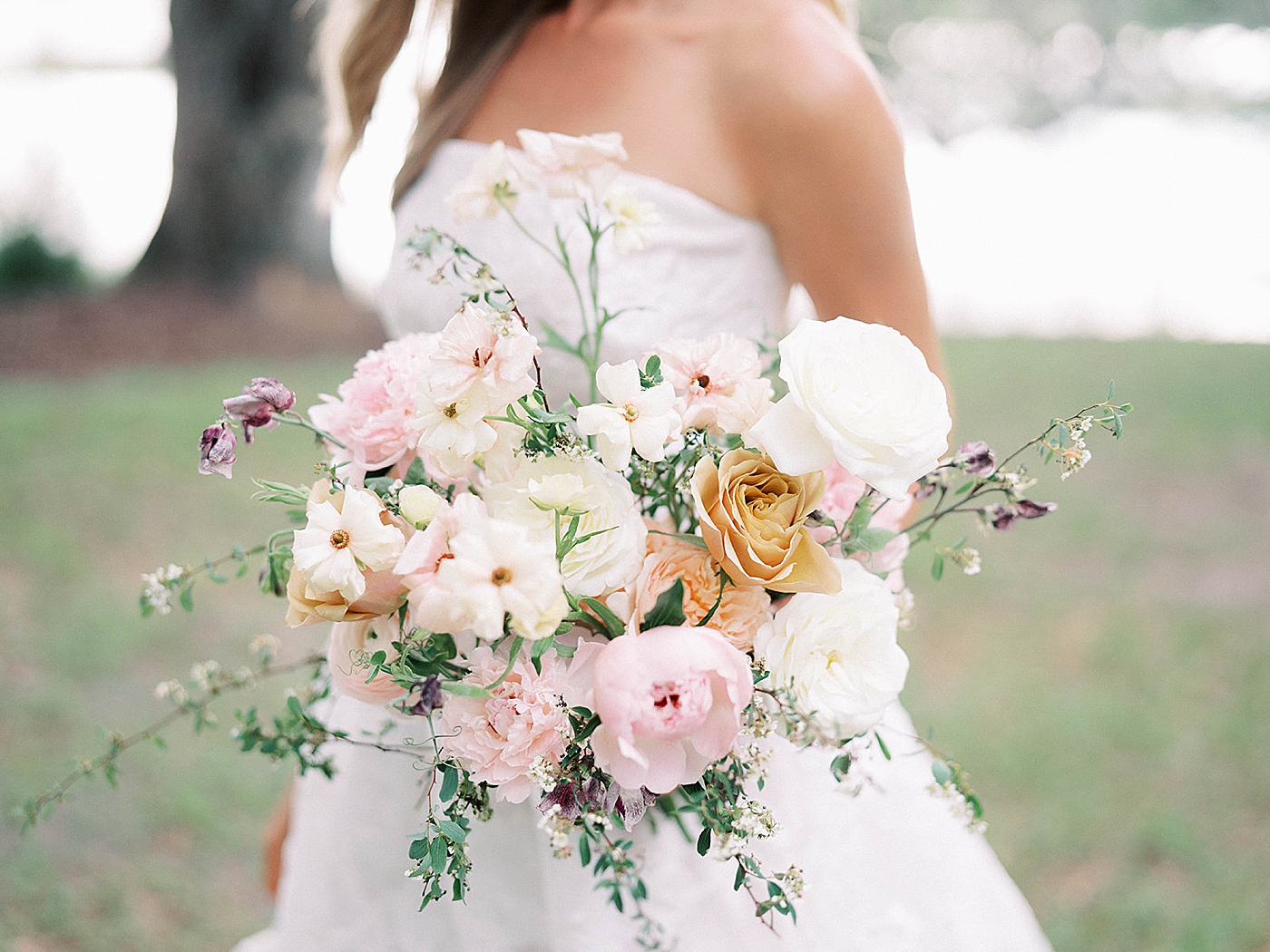 Details of bridal bouquet held by bride | Carters Event Co