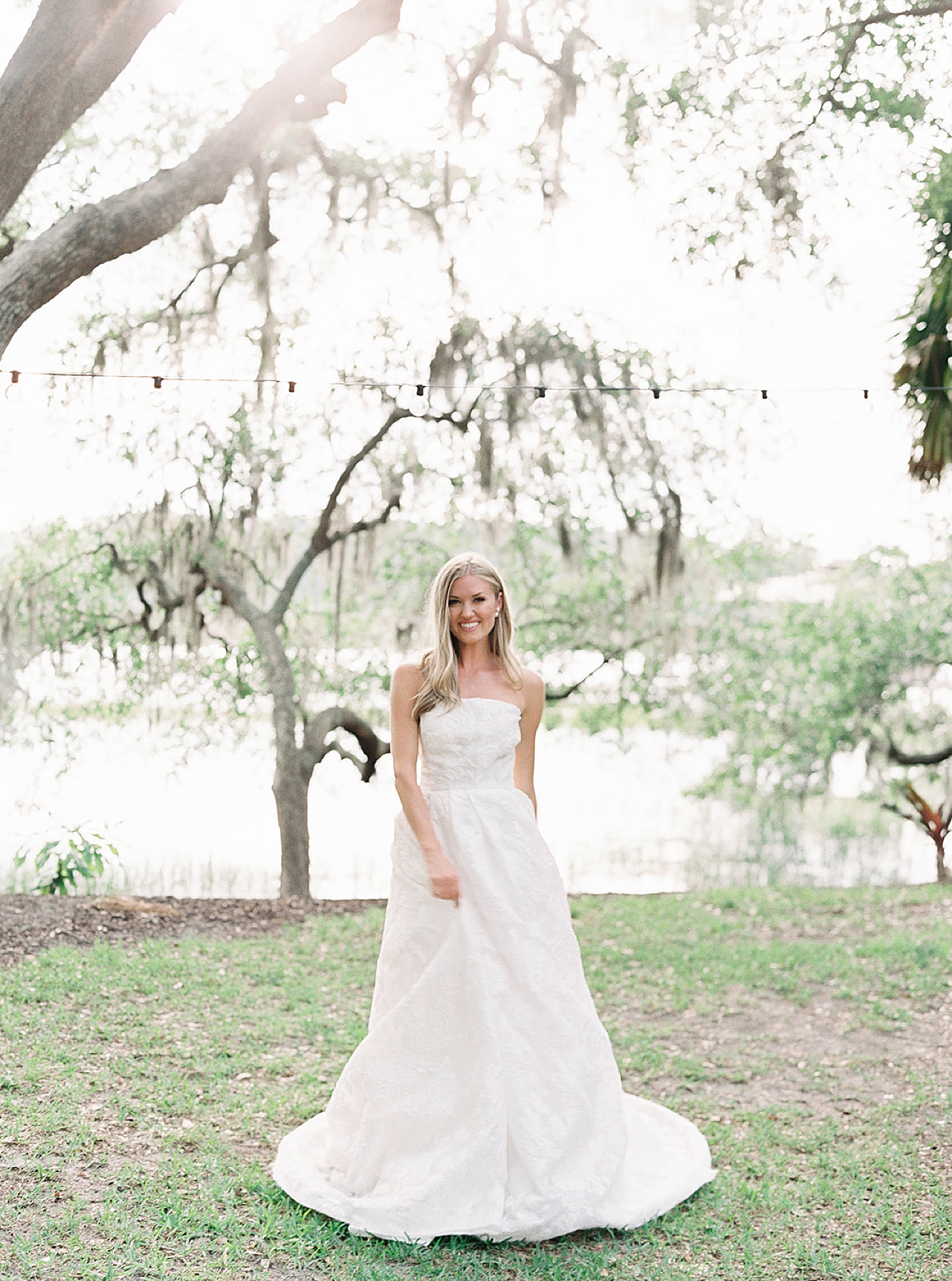 Bride in white gown twirling | Carters Event Co