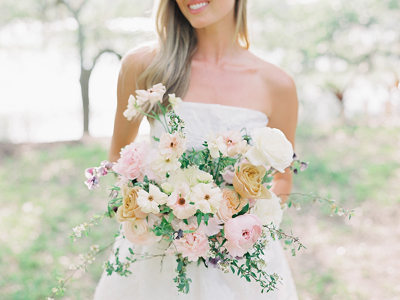 Bridal bouquet with spring blooms | Carters Event Co